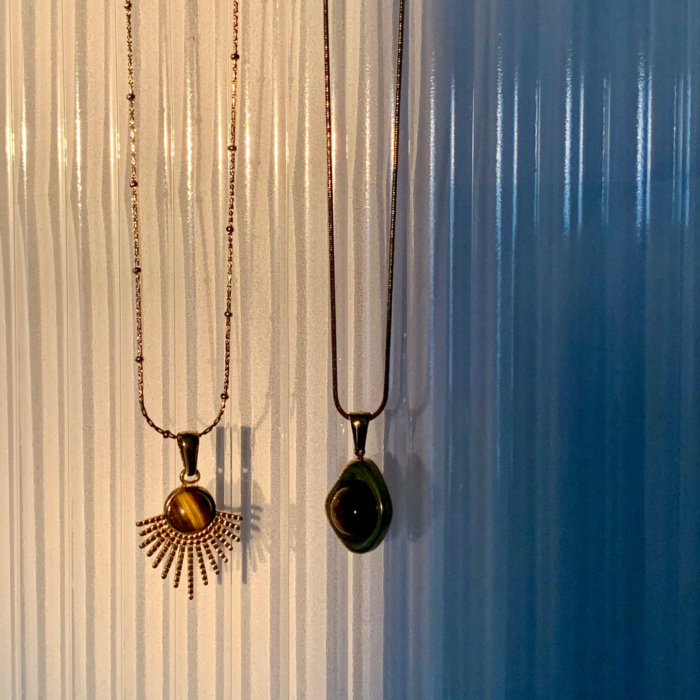 Group view of the Courage Power Tiger Eye Necklaces displaying the secure clasp and luxurious design.