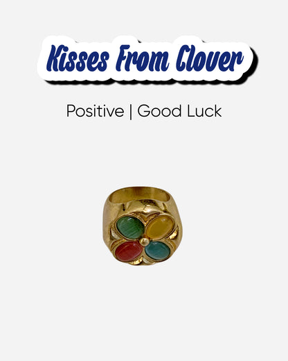 Four Leaf Clover Cat's Eye Ring with white background representing good energy