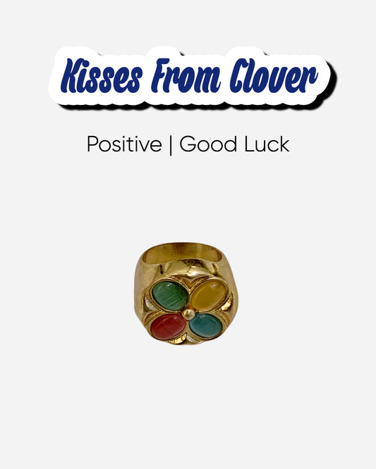 Four Leaf Clover Cat's Eye Ring with white background representing good energy
